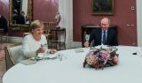 Застолье Путина и Меркель довело украинцев до истерики