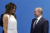 «Кокетничает с ВВП»: Путин отреагировал на провокационное фото с Меланьей Трамп
