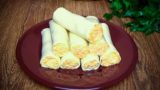 Сырные рулеты с морковью: рецепт быстрой закуски к праздничному столу