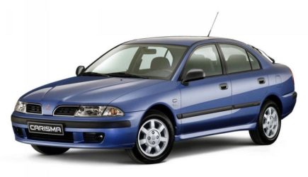 Почему на глушителе Mitsubishi Carisma появляется сажа? Разбираем причины и решения!