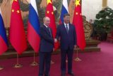 &laquo;Дракон в дружеских объятиях медленно задушит медведя&raquo;: Девятов о переговорах Путина и Си Цзиньпина